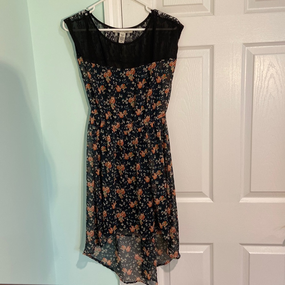 A medium navy American Rag dress with flowers